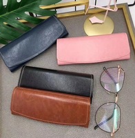 Boîte à lunettes rigide bon marché avec logo rétro à la mode étuis à lunettes en cuir PU