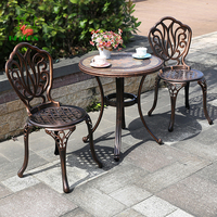 Ensemble table et chaises de jardin vintage en aluminium et fonte pour bistrot en métal et patio