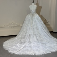 Robe de mariée sirène Jancember XS330 sexy sans bretelles en maille à sequins et perles avec surjupe