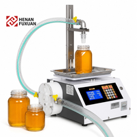 Machine de remplissage semi-automatique pour liquides visqueux (eau, jus, boissons, pâtes, miel, huile) en bouteilles PET, plastique, verre et bidons