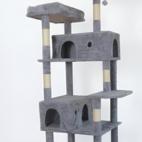 Arbre à chat géant en gros avec deux niches pour chats, poteaux en sisal et plateformes en peluche multi-niveaux, emballé en carton pour grands chats