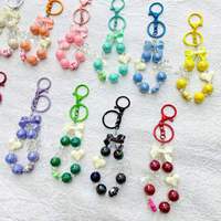 Promotion : Bracelet mignon à nœud perlé, pendentif cœur et fleur, accessoire de coque de téléphone, dragonne porte-clés, breloque colorée pour sac
