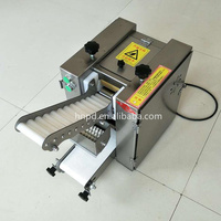 Machine automatique pour la fabrication de peaux de mini-roti, momo, siomai, gyoza, wonton et dumplings