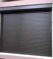 Porte à enroulement pliable en alliage d'aluminium gris foncé pour garage extérieur et sécurité d'entrepôt