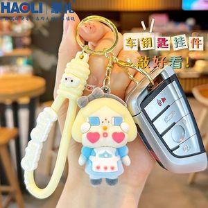 Llavero de silicona con diseño de niña de dibujos animados, portátil, para bolso, regalo. - Product Image 2
