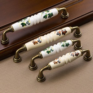 มือจับเซรามิกยี่ฉี รุ่น B13 สไตล์จีนใหม่ สำหรับตู้  แบบโบราณ สีบรอนซ์ - Product Image 1