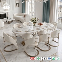 Moderne minimalistische ovale eettafel met marmeren blad, voetstuk en 8 kristallen stoelen, restaurantset, complete huisinrichting op maat
