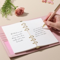 Carnet à anneaux rechargeable rose à 6 anneaux avec nœud