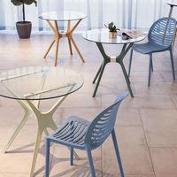 Table à manger ronde transparente non fragile de conception nordique avec des pieds en PC en verre trempé pour la maison salon hôtel