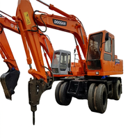Excavatrice sur pneus Doosan Dh130 d'occasion Excavatrices sur pneus Doosan 130 140 d'occasion à vendre