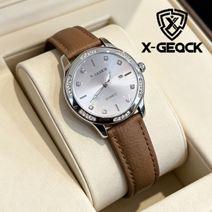 Reloj de cuarzo clásico de moda X-GEQCK para mujer, de cuero, con calendario, puntero, luz nocturna, resistente al agua, estilo empresarial, sencillo - Product Image 1