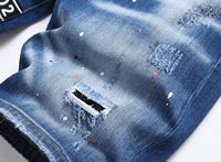 Jean utilitaire lavé à la pierre respirant Style Hip Hop High Street Broderie Rivet Patch cassé Saupoudrer Point de peinture pour le printemps