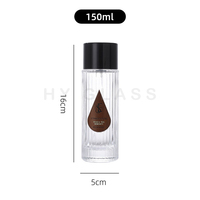Bouteille de parfum vaporisateur originale personnalisée bouteille de parfum transparente usine vente en gros 150ml bouteille de parfum en verre cylindrique cannelé avec bouchon