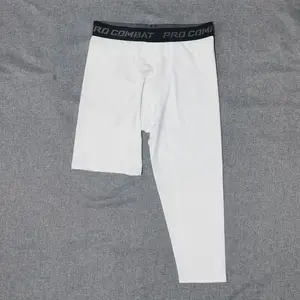 Venta al por mayor de secado rápido pantalones de Yoga medias 3/4 fitness pantalones ajustados baloncesto para hombres leggings de compresión blanco