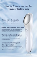 Appareil de massage facial chauffant et vibrant pour stimuler le collagène et unifier le teint, avec luminothérapie