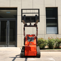 Mini-chargeuse compacte sur chenilles certifiée EPA avec moteur diesel Honda et PLC, idéale pour les travaux de construction