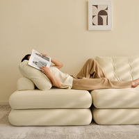 Canapé-lit modulaire combiné à un siège en tissu amovible pour salon moderne avec dossier en forme de coussin et rembourrage en éponge