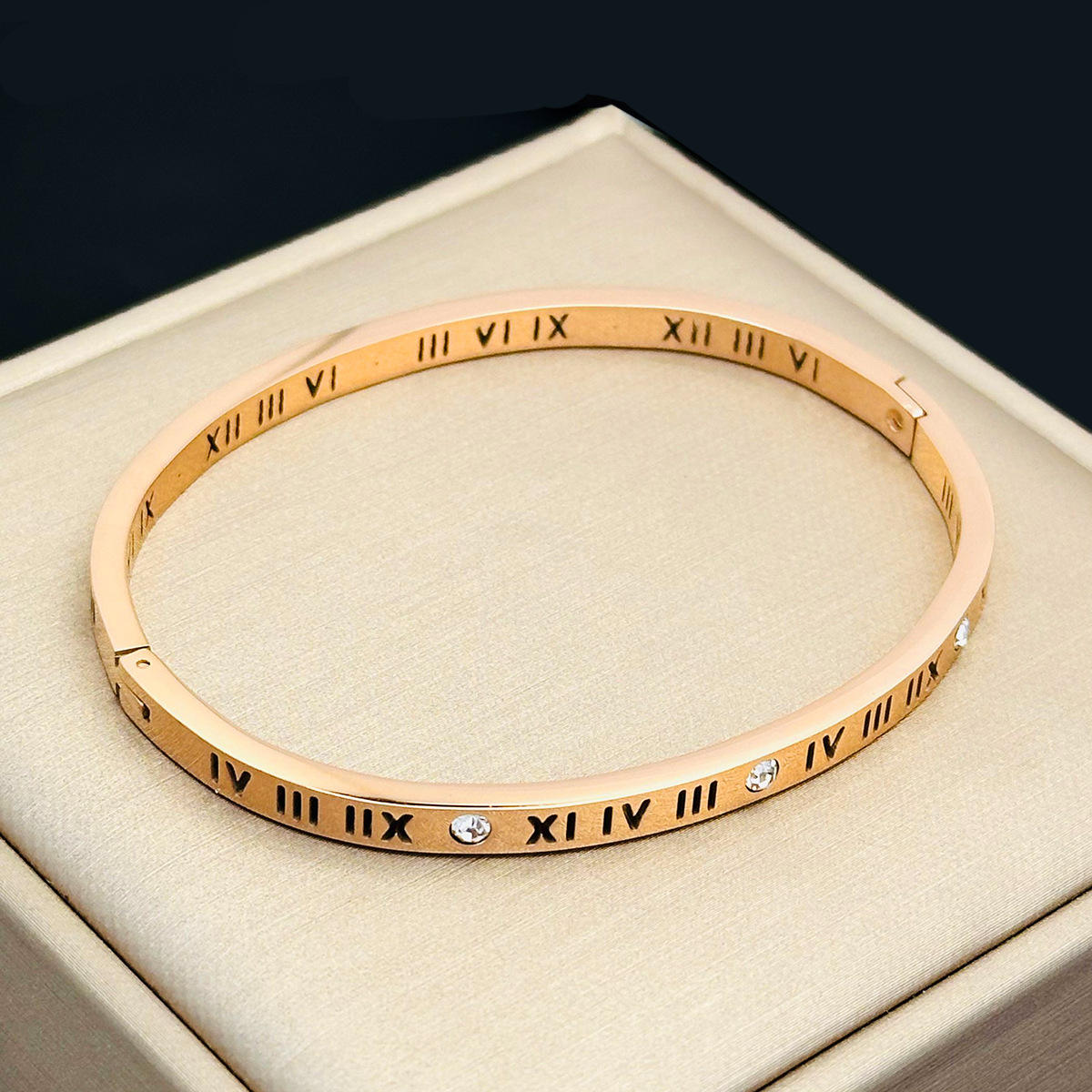 A [4004] 4mm wide hollow roman numeral rose gold
