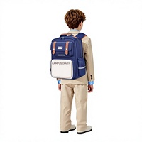 Mochila Escolar Impermeable con Protección para la Espalda y Amortiguación de Aire, Diseño Ligero y Gran Capacidad para Estudiantes de Primaria, Estilo 2026