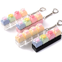 High Quality Wholesale Cute Backpack Accessories Keycap Key Chain Fidget Clicker Keychain Decompression Toy Cat's Claws Keypad