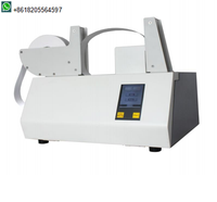 Machine automatique de cerclage de billets de banque avec ruban thermoscellant