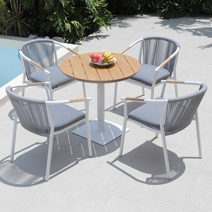 เฟอร์นิเจอร์กลางแจ้งอลูมิเนียมหรูหรากันน้ําทนทานไม้สักเชือกทอชุดโต๊ะรับประทานอาหารและเก้าอี้หรูหรา 6 ที่นั่ง - Product Image 4