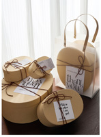 Boîte cadeau elliptique artisanale de qualité supérieure en papier kraft recyclé pour les marques durables