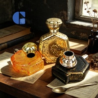 Flacon de parfum vintage en verre octogonal 100 ml, décoré de feuille d'or de luxe, vide et rechargeable, avec bouchon