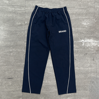 Fabricants de vêtements sur mesure : Survêtements oversize zippés, ensembles de survêtements en nylon avec impression sérigraphiée, coupe-vent à passepoil pour hommes
