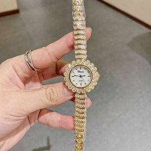 Reloj de pulsera minimalista redondo con diamantes para mujer, pulsera informal de moda, reloj de cuarzo elegante con diamantes completos - Product Image 6