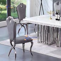 Chaise de salle à manger de luxe moderne avec revêtement en velours imperméable et dossier, structure en acier inoxydable gris foncé pour appartement