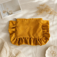 Pochette en velours côtelé à volants pour l'automne et l'hiver, pochette de maquillage en tissu de couleur unie, sac de rangement cosmétique portable pour les voyages et les sorties