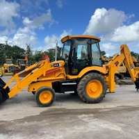 Chargeuse-pelleteuse hydraulique 4x4 d'occasion JCB 3CX pour travaux de construction, agricoles et d'ingénierie