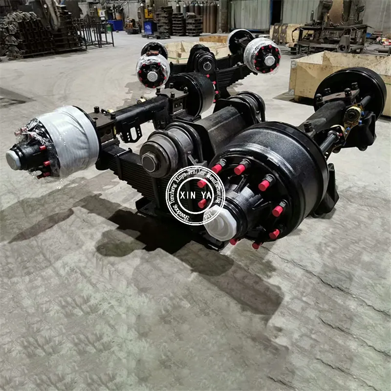 Single point suspension bogie tandem trailer axle