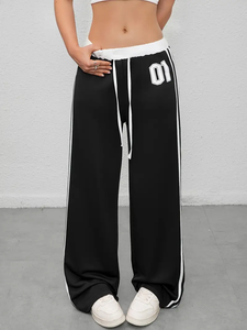 Dropshipping de joggers chic pour femmes en noir et blanc avec impression numérique, cordon de serrage à la taille et poches latérales-décontracté - Product Image 2