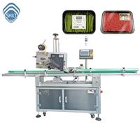Machine d'étiquetage et d'emballage automatique SKILT NOVEXX pour l'impression en ligne sur le dessus des boîtes dépliées en carton