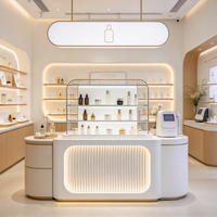 Comptoir de présentation de cosmétiques de luxe léger en verre, table de présentation de parfums, mobilier de présentation sur mesure pour salon de beauté et soins de la peau