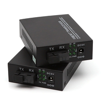 Convertisseur de média fibre optique monomode 10/100/1000 Mbps 4RJ45 + 10/100/1000 Mbps 1SC 20 km CE/FCC pour CCTV et applications industrielles