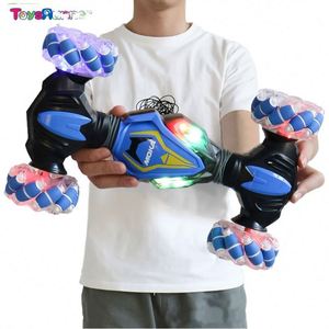 Nuevo Coche Eléctrico de Control Remoto de Cuatro Ruedas, Vehículo Todoterreno RC, Mini 4X4, Juguete Acrobático Giratorio, Control Remoto de Doble Cara, Cable USB - Product Image 1