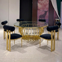 Table de salle à manger moderne pour hôtel avec plateau en verre rond et structure en acier inoxydable pour les événements de mariage et de banquet