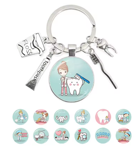 Porte-clés en métal avec pendentif en forme de fil dentaire, dentifrice, <span class=keywords><strong>brosse</strong></span> <span class=keywords><strong>à</strong></span> dents, cabochon en verre, cadeau <span class=keywords><strong>pour</strong></span> dentiste, assistant dentaire, soins <span class=keywords><strong>dentaires</strong></span> - Product Image 1