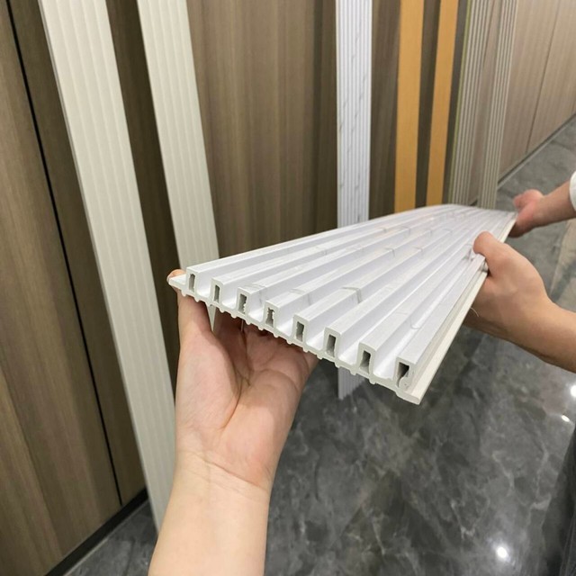 WPC Wall Panel Marble Alternative Plastic PVC UV Fluted Great Wall Panel for Indoor Home Decoration Waterproof Interior Walls