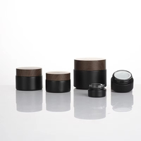 En Stock vente en gros 5/10/15/20/30/50g pots de crème pour le visage noir mat 1 2 4 Oz bocaux en verre avec couvercle en plastique grain de bois