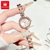 OLEVS 5679 Montre à quartz élégante en acier inoxydable de luxe avec logo personnalisé Odm, calendrier diamant, étanche, lumineuse pour femme