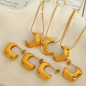 Conjunto de aretes y collar minimalistas con forma de luna, chapados en oro de 18 quilates, acero inoxidable, joyería unisex de moda. - Product Image 1