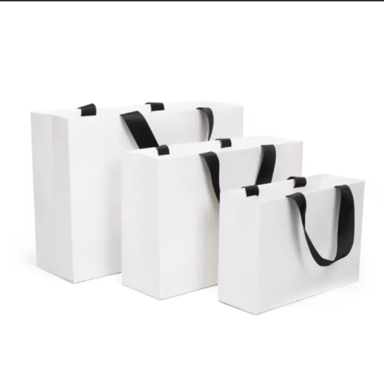 उपहार लपेटने के लिए अनुकूलित डिजाइनर लोगो मुद्रित शॉपिंग पेपर बैग लक्जरी पैकेजिंग पेपर बैग