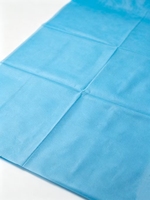 Draps médicaux jetables portables très demandés, matelas imperméable non tissé respirant avec trous pour une utilisation en milieu hospitalier