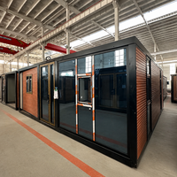 Maison conteneur préfabriquée extensible de luxe 20/40 pieds, maisonnette moderne mobile modulaire avec terrasse pour Airbnb