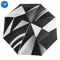 Parapluie de golf monochrome à motifs géométriques abstraits noir et blanc, résistant au vent, idéal pour les expositions d'art et les cadeaux personnalisés