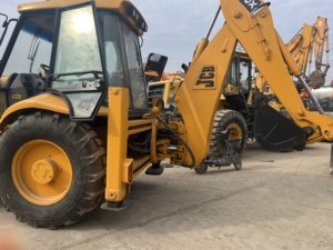 รถตักล้อยาง JCB รุ่น 4CX สีเหลือง มือสอง อุปกรณ์ก่อสร้าง น้ำหนักบรรทุก 9 ตัน เครื่องยนต์คัมมินส์ - Product Image 3